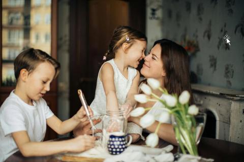 family gathering around talble